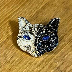 Black and white cat brooch with gold accents and rhinestones w/blue eyes 1 1/2”